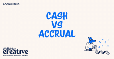 Text: "cash vs accrual" in the middle, on a beige background, featuring an illustration in the bottom right corner and WallsMan Creative logo in the bottom left corner.